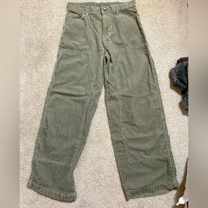Men's green pants. Comfy and baggy with line pattern cloth